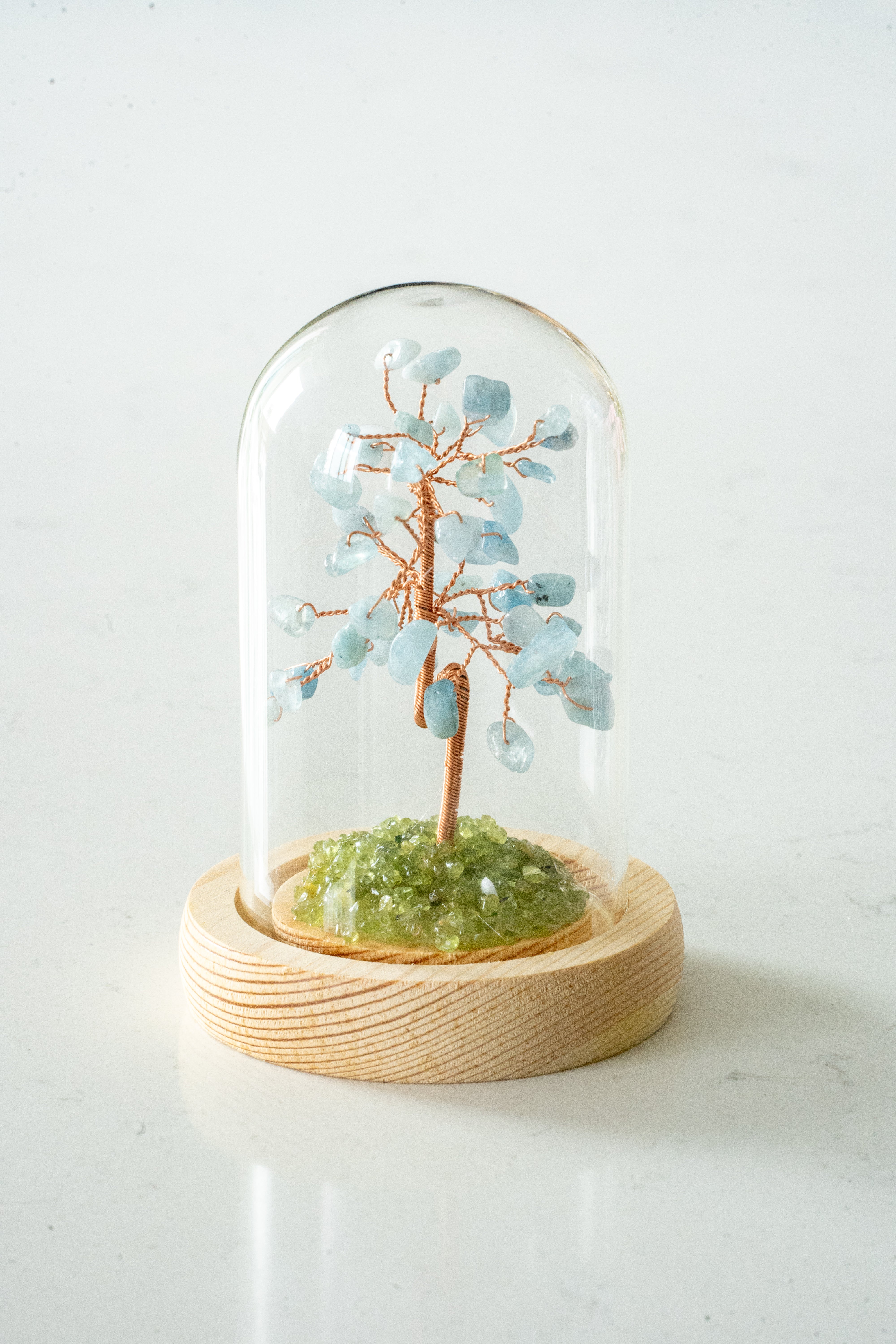 Small blue crystal tree with glass